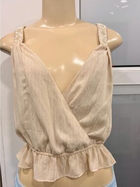 bebe Embellished strap surprise top. Cream Textured Sleeveless